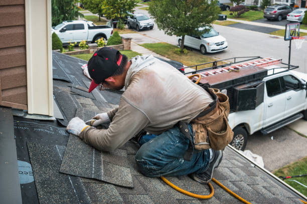 Professional Flat Roof Repair technician working in Livingston Manor, NY